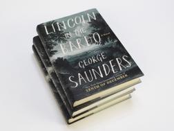 lincoln in the bardo by george saunders book stack